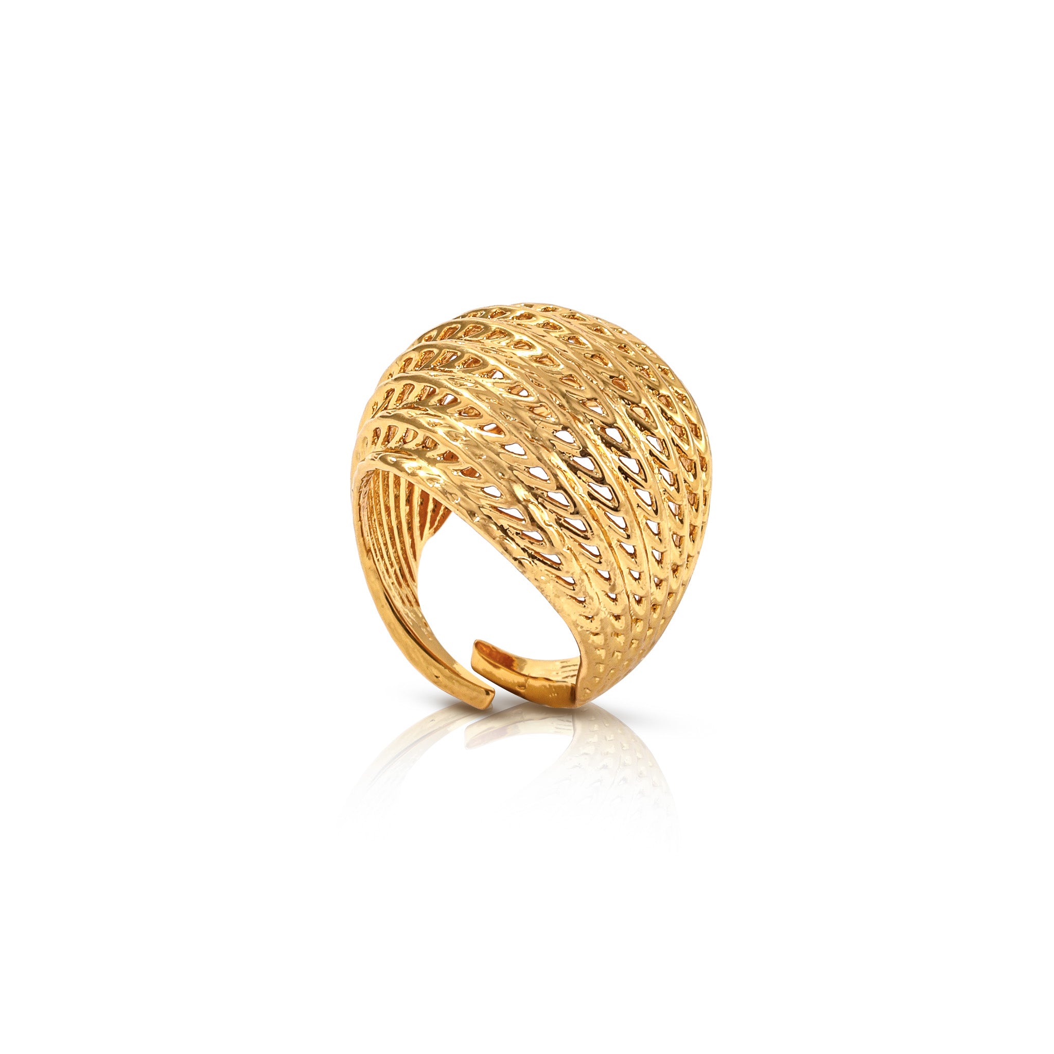 Gold ring with intricate design on a white background