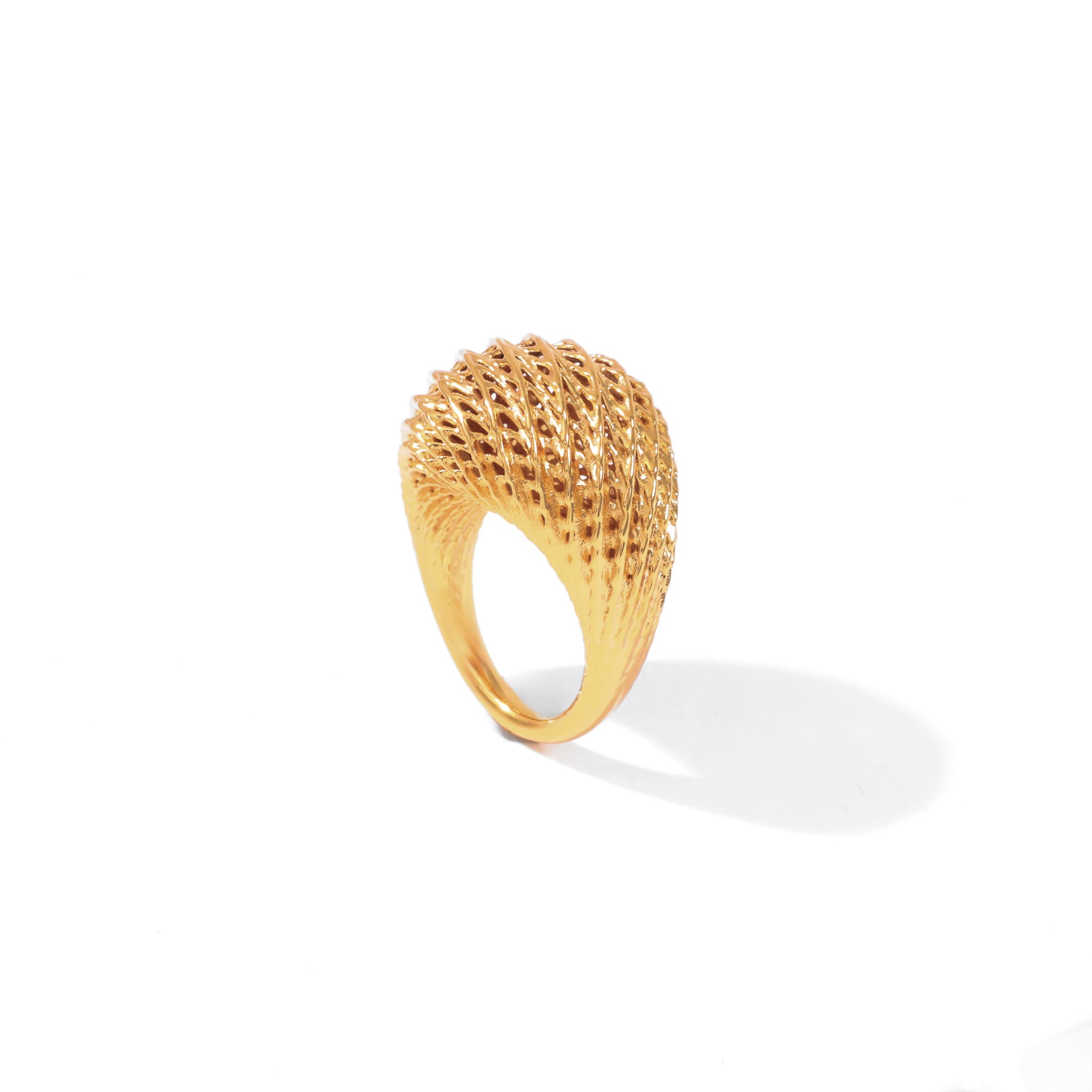 Gold Flow Edgy Dome Ring with sharp rippling ridges across a domed form, on white