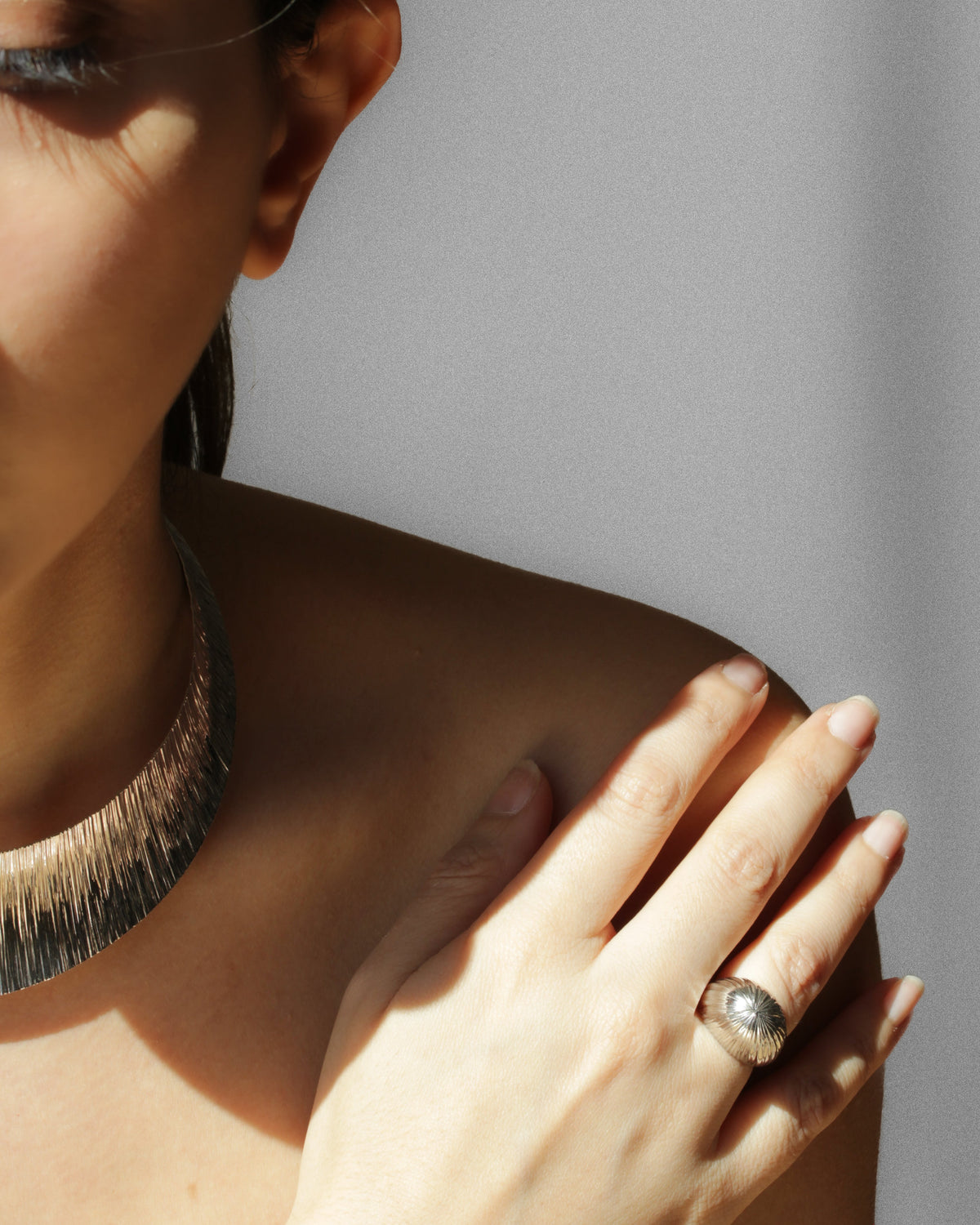 Model wearing the Cascade dome ring in Rhodium finish