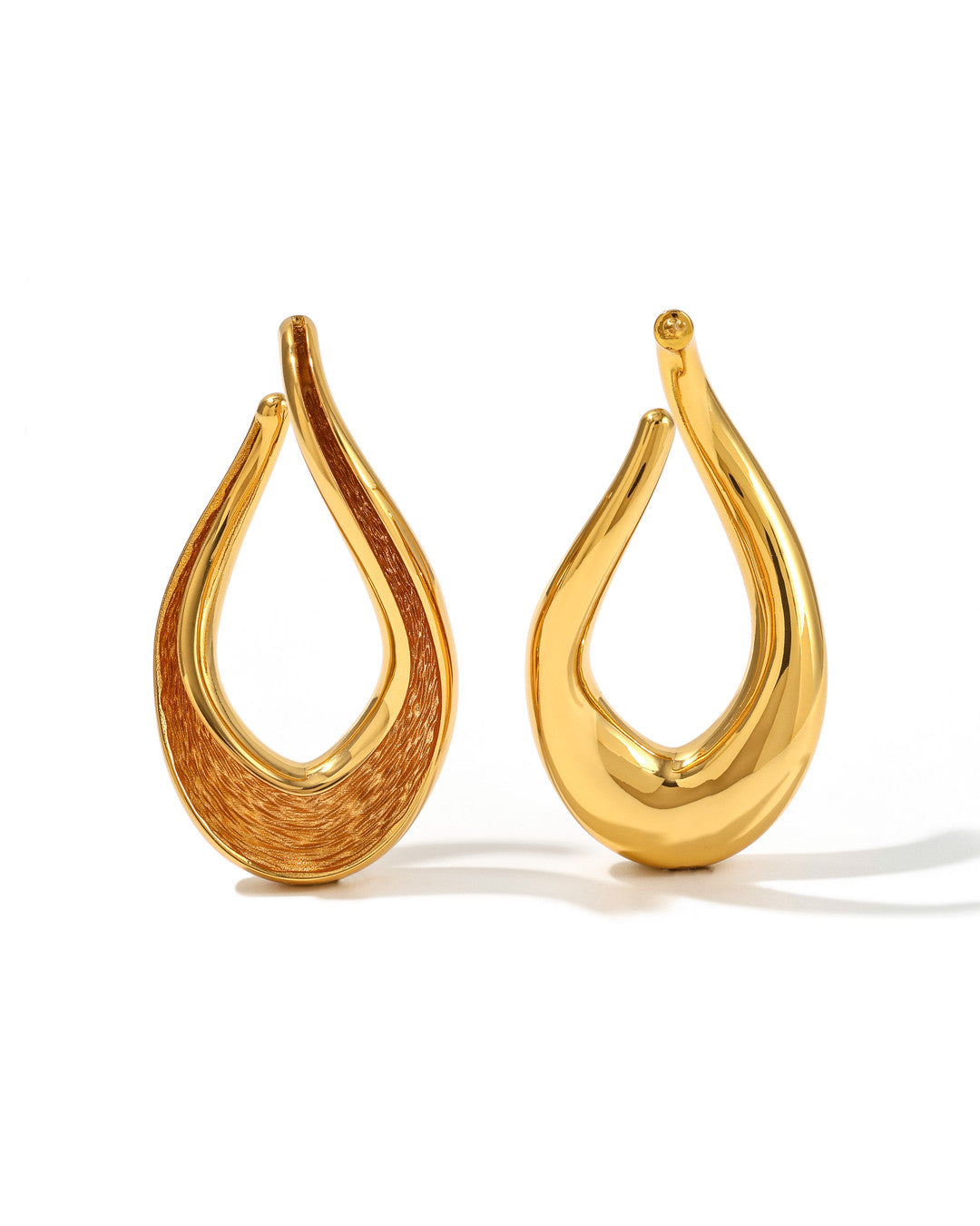 Currents Infinity Earrings with 24k Gold finish with smooth exterior and textured interior 