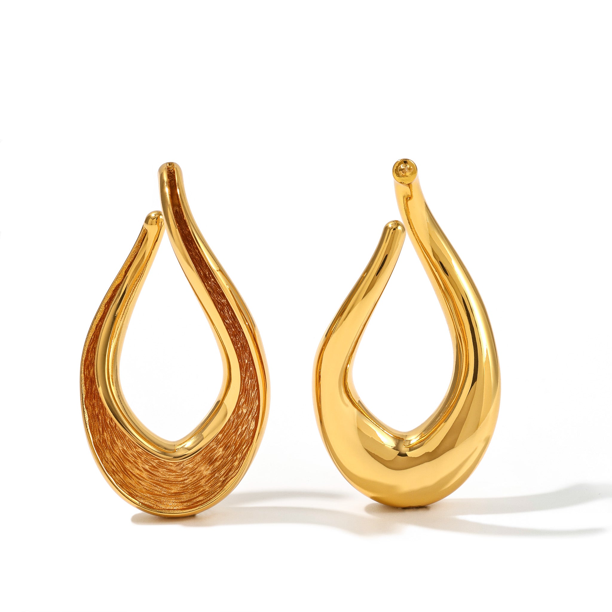 Currents Infinity Earrings with 24k Gold finish with smooth exterior and textured interior 