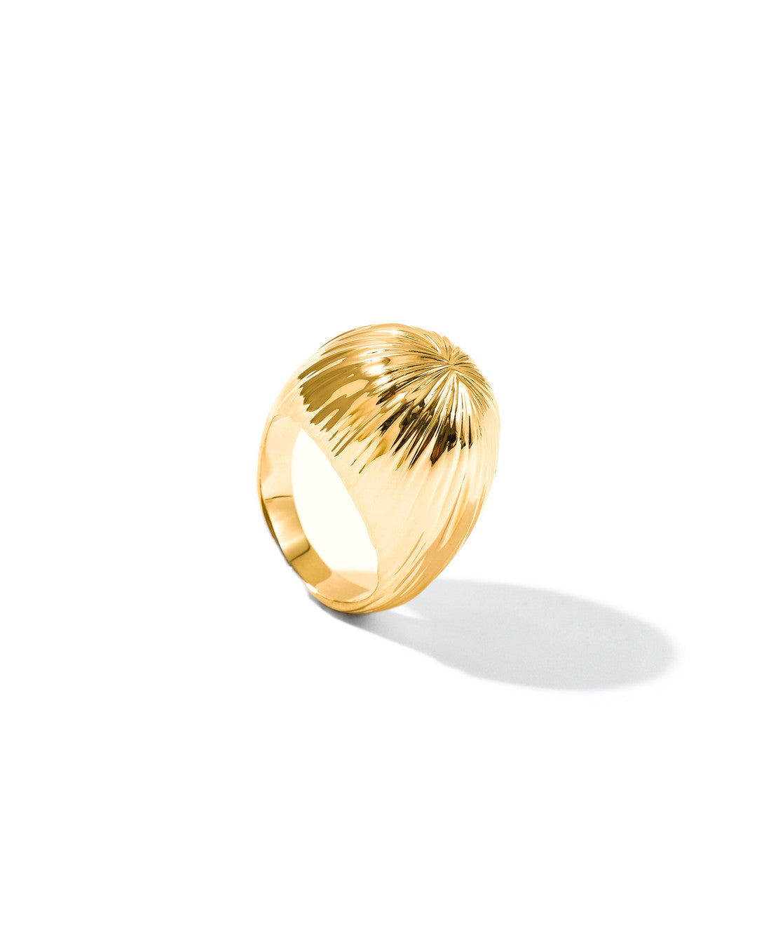 Gold Cascade dome statement ring with a cascading textured surface, on white
