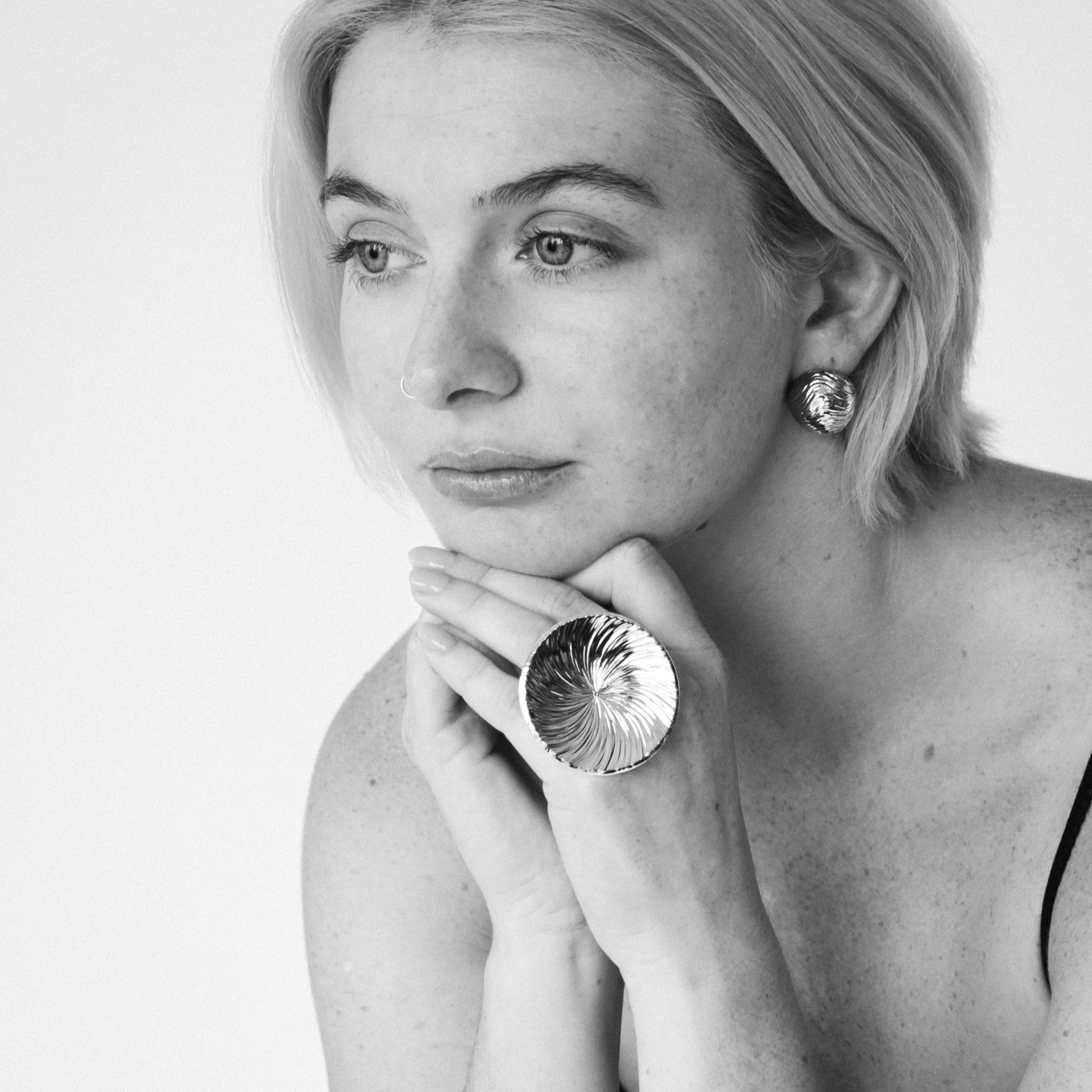 Model wearing the gold Vortex Ring